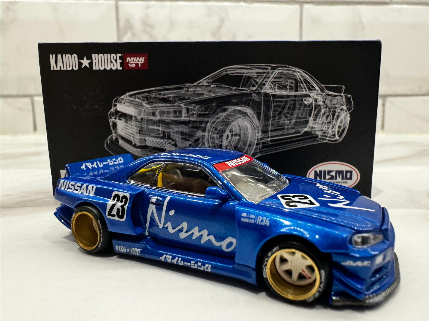 Mini GT x Kaido House 1:64 Nissan Skyline GT-R (R34) Kaido Works V3 Blue CHASE