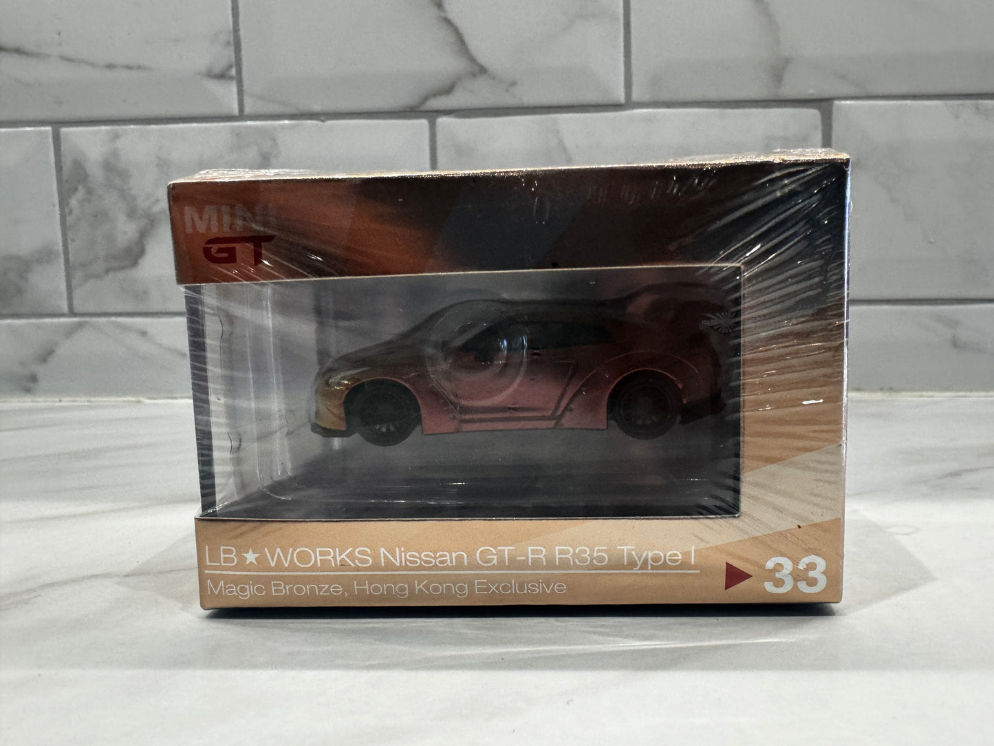 Mini GT 33 1/64 LB WORKS Nissan GT-R (R35) Magic Bronze [HONG KONG EXCLUSIVE]