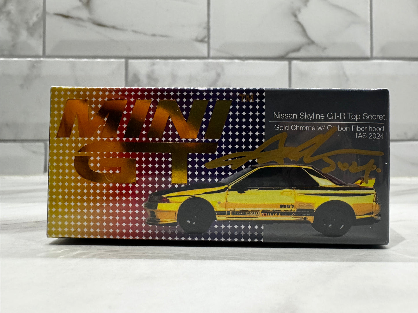 MINI GT Nissan Skyline GT-R Top Secret VR32 Gold Tokyo Auto Salon 2024 Limited Signed by Glen Chou Director & CEO OF TSM MODELS