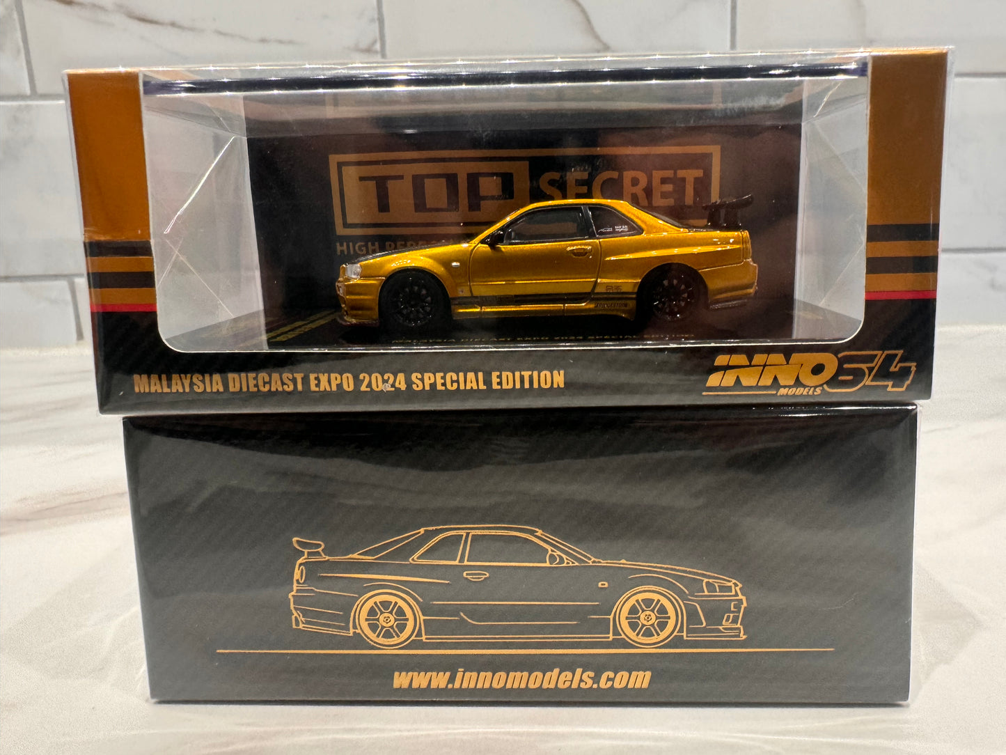 INNO 64 Nissan Skyline GT-R (R34) Top Secret Tokyo Auto Salon Gold Special Edition MDX24 EXCLUSIVE UK SELLER