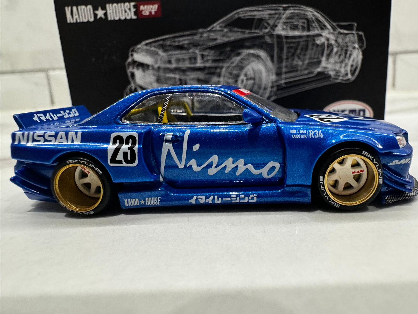 Mini GT x Kaido House 1:64 Nissan Skyline GT-R (R34) Kaido Works V3 Blue CHASE